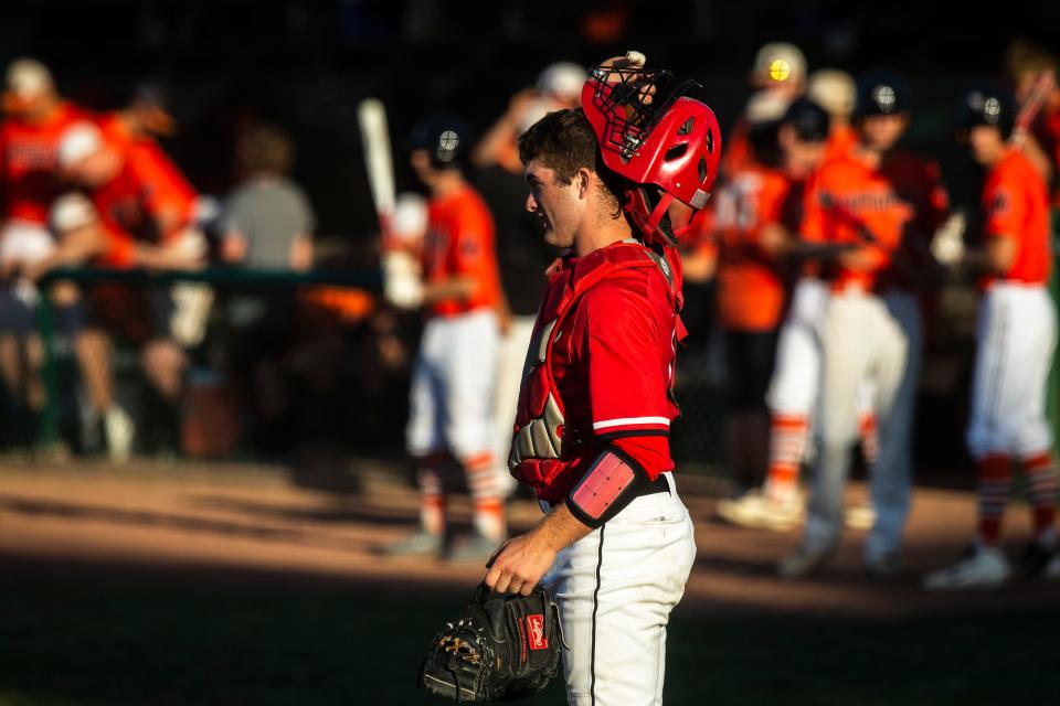 Western Dubuque catcher Calvin Harris settles in at home plate during a 2019 baseball game at Paul Scherrman Field in Farley.