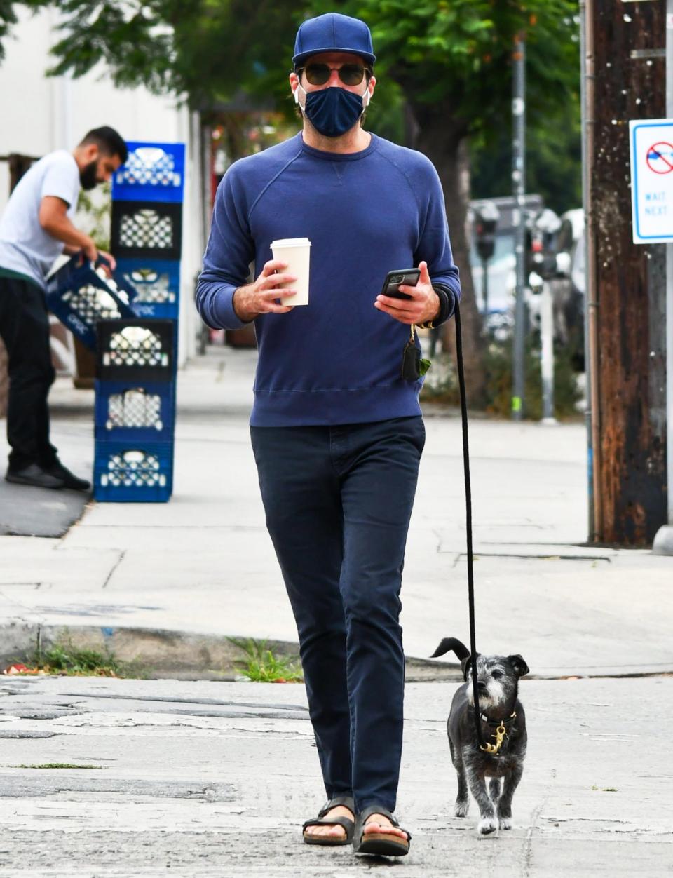 <p>Zachary Quinto and his pup go out for a stroll in L.A. on Wednesday.</p>