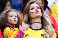 <p>Rafaella Szabo the wife of Axel Witsel of Belgium and her daughter attend the 2018 FIFA World Cup Russia Semi Final match between Belgium and France at Saint Petersburg Stadium on July 10, 2018 in Saint Petersburg, Russia. (Photo by Laurence Griffiths/Getty Images) </p>