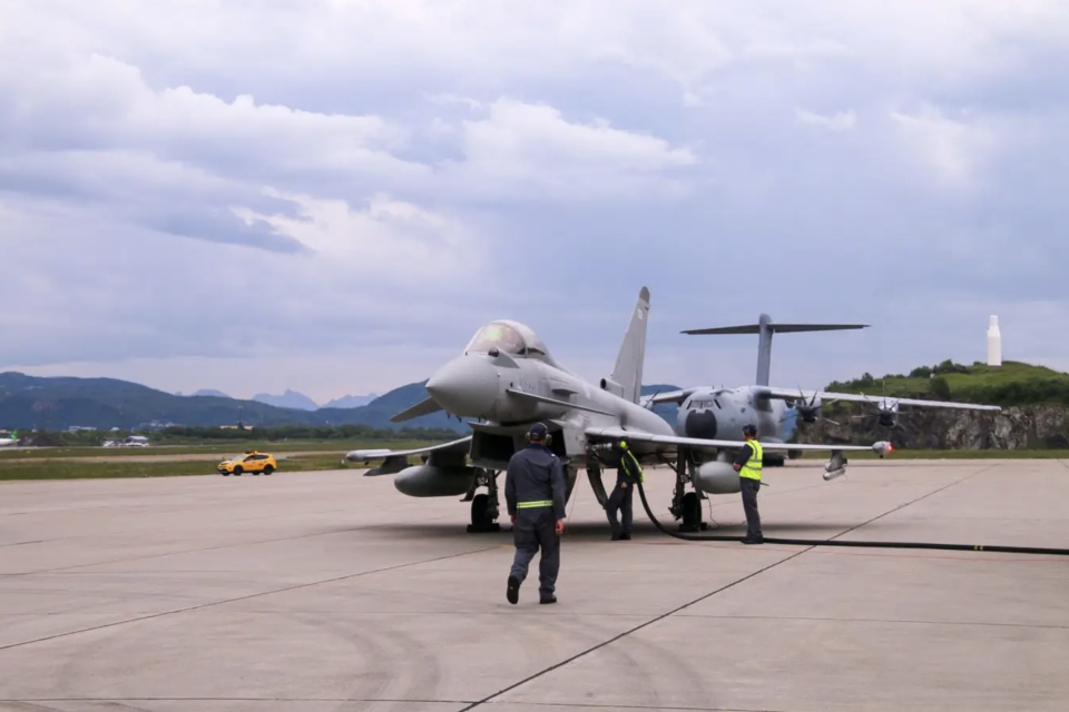 An RAF Typhoon is refueled in front of an A400M transport, during the 2021 exercise in Norway that tested ways to disperse Typhoon jets to different locations. <em>Crown Copyright</em><br>