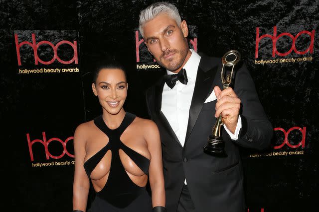 <p>MediaPunch/Shutterstock</p> Kim Kardashian and Chris Appleton at 5th Annual Hollywood Beauty Awards in Los Angeles on Feb.17, 2019
