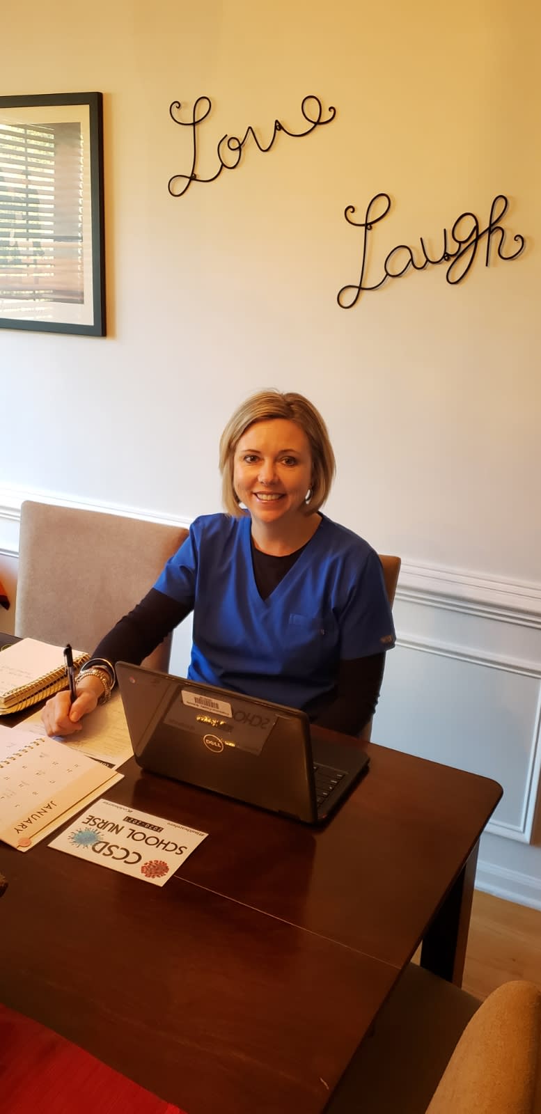 Sherri Groenland, a nurse at Wando High School in Mt. Pleasant, S.C., pictured at home contact tracing in an effort to help prevent the spread of COVID-19 at her school. <span class="copyright">Courtesy Sherri Groenland</span>