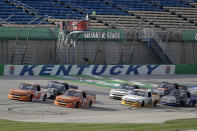 Drives run at the start of a NASCAR Truck Series race Saturday, July 11, 2020, in Sparta, Ky. (AP Photo/Mark Humphrey)