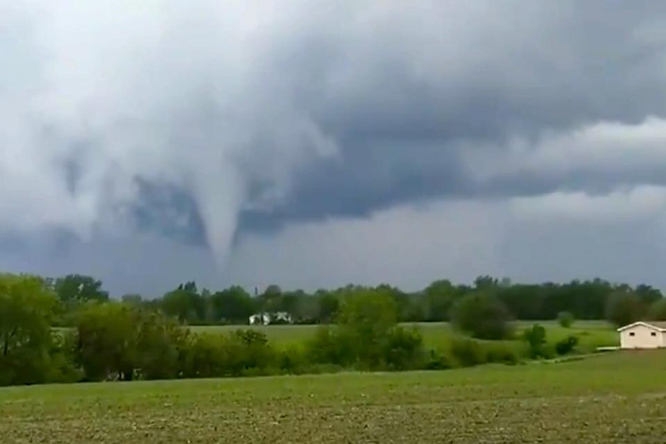 A funnel cloud is seen in Waukee around 1:30 PM CT on Tuesday.