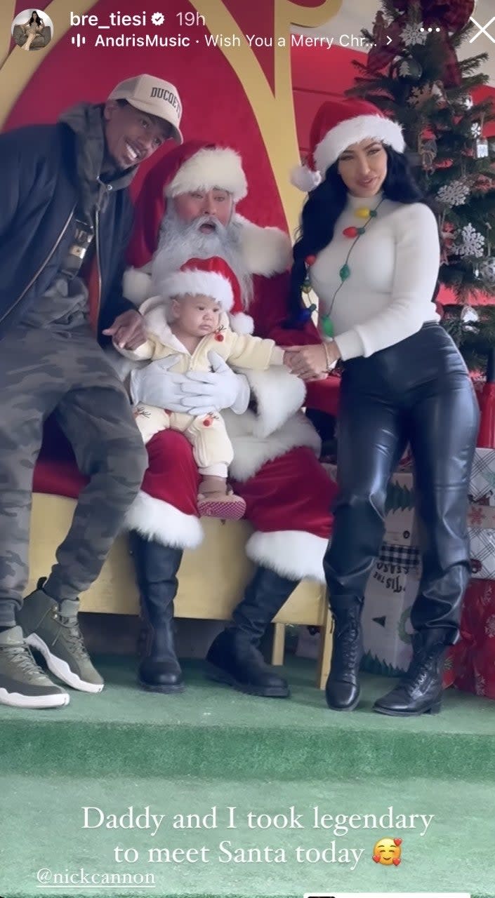 Nick Cannon and Bre Teisi take son to meet Santa 