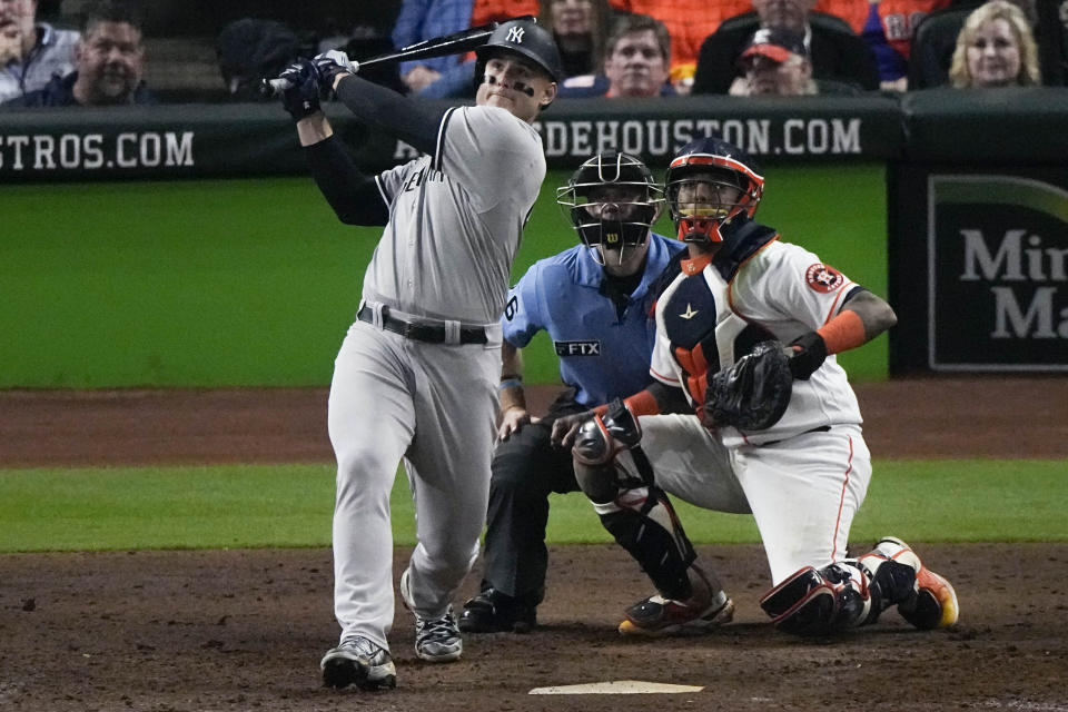 New York Yankees Anthony Rizzo (48) hits a solo homer during the eighth inning in Game 1 of baseball's American League Championship Series between the Houston Astros and the New York Yankees, Wednesday, Oct. 19, 2022, in Houston. (AP Photo/Sue Ogrocki )