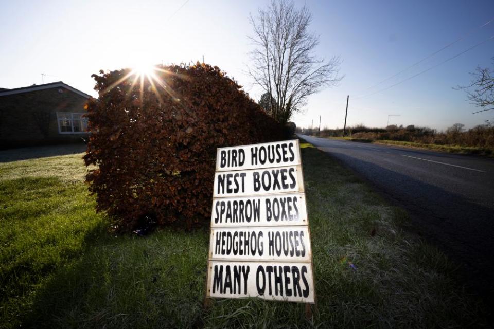 A sign advertises Ely Stimpson’s wildlife boxes for birds and hedgehogs