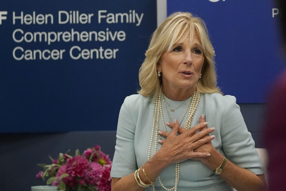 FILE - First lady Jill Biden gestures while meeting with medical professionals and students during a visit to the University of California San Francisco Helen Diller Family Comprehensive Cancer Center in San Francisco, Oct. 7, 2022. (AP Photo/Jeff Chiu, Pool, File)