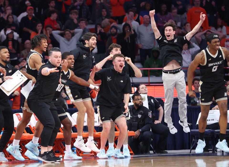 The Bryant bench celebrates as the Bulldogs take back the lead late in Saturday's game.