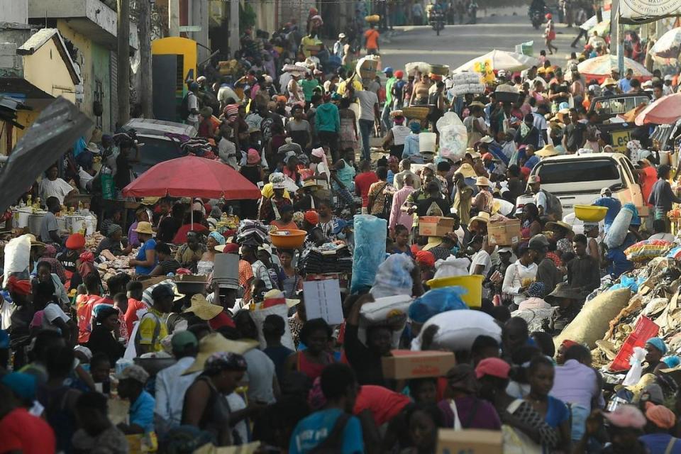 Street vendors work despite a continued general strike in Port-au-Prince, Haiti, Tuesday, Oct. 26, 2021.