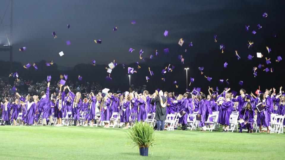 Columbia Central High School graduation takes place on the school football field in Columbia, Tenn. on May. 15, 2023. Class of 2023 seniors toss their hats in celebration.