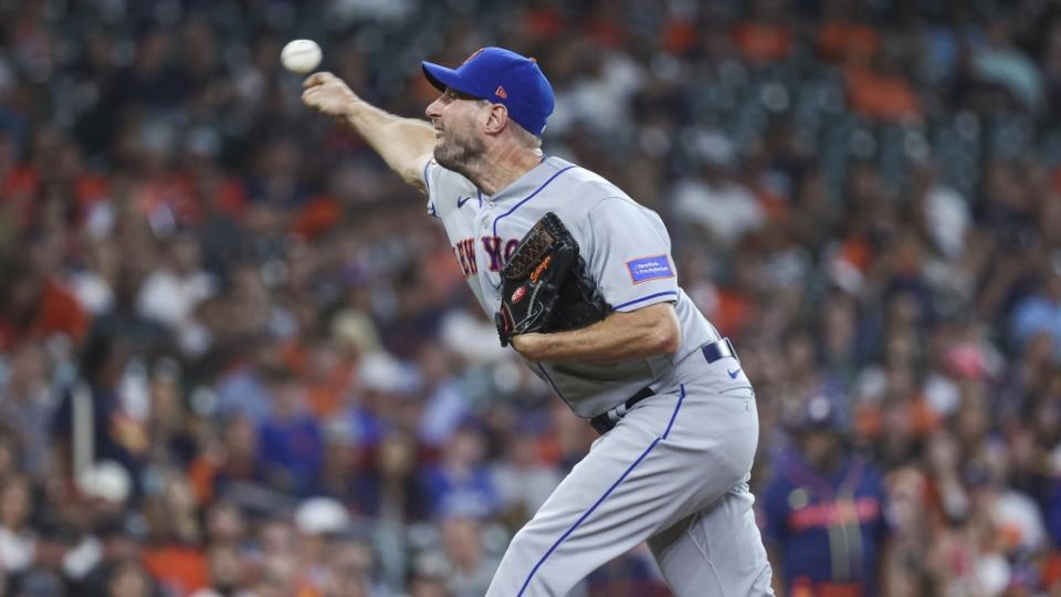 New York Mets starting pitcher Max Scherzer (21) delivers a pitch during the first inning against the Houston Astros at Minute Maid Park