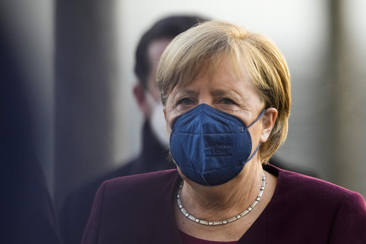 German Chancellor Angela Merkel arrives for a debate about the measures to battle the coronavirus and COVID-19 at the parliament Bundestag in Berlin, Germany, Thursday, Nov. 11, 2021. Germany's national disease control center reported a record-high number of more than 50,000 daily coronavirus cases on Thursday as the country's parliament was set to discuss legislation that would provide a new legal framework for coronavirus measures.(Photo/Markus Schreiber)