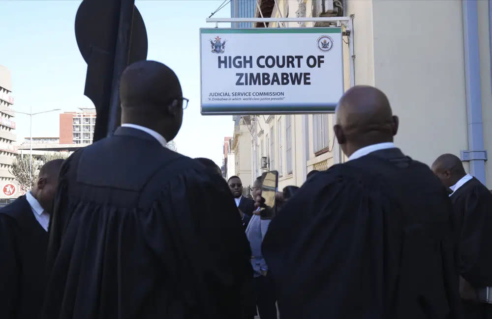 Lawyers are seen outside the High Court in Zimbabwe, on Wednesday, June, 21, 2023 photo. (AP Photo/Tsvangirayi Mukwazhi)