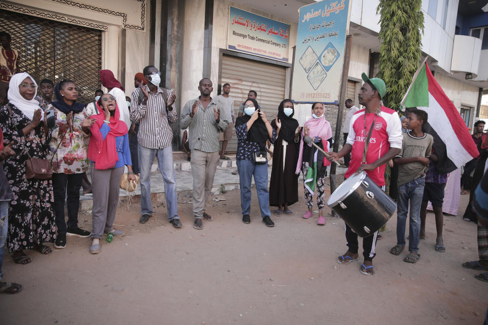 People chant slogans during a protest in Khartoum, amid ongoing demonstrations against a military takeover in Khartoum, Sudan, Thursday, Nov. 4, 2021. (AP Photo/Marwan Ali)