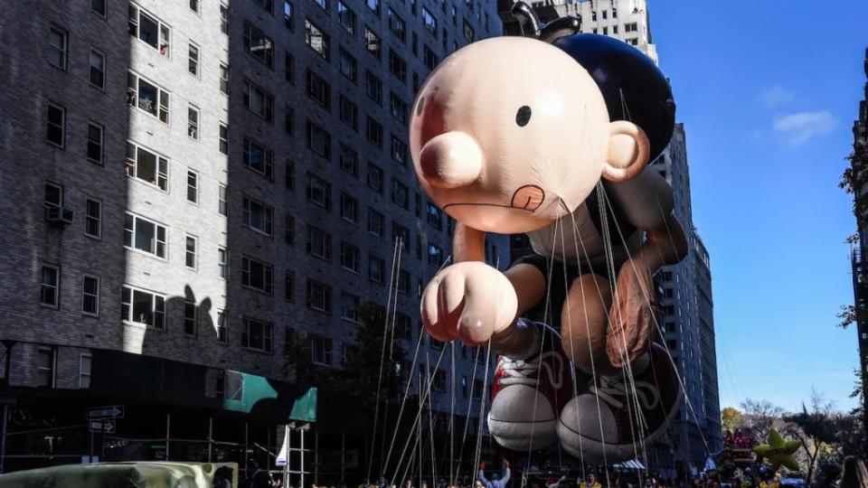 The Diary of a Wimpy Kid balloon floats in Macy’s annual Thanksgiving Day Parade on Nov. 23, 2023 in New York City. Thousands of people lined the streets to watch the 25 balloons and hundreds of performers march in this parade happening since 1924. (Photo by Stephanie Keith/Getty Images)