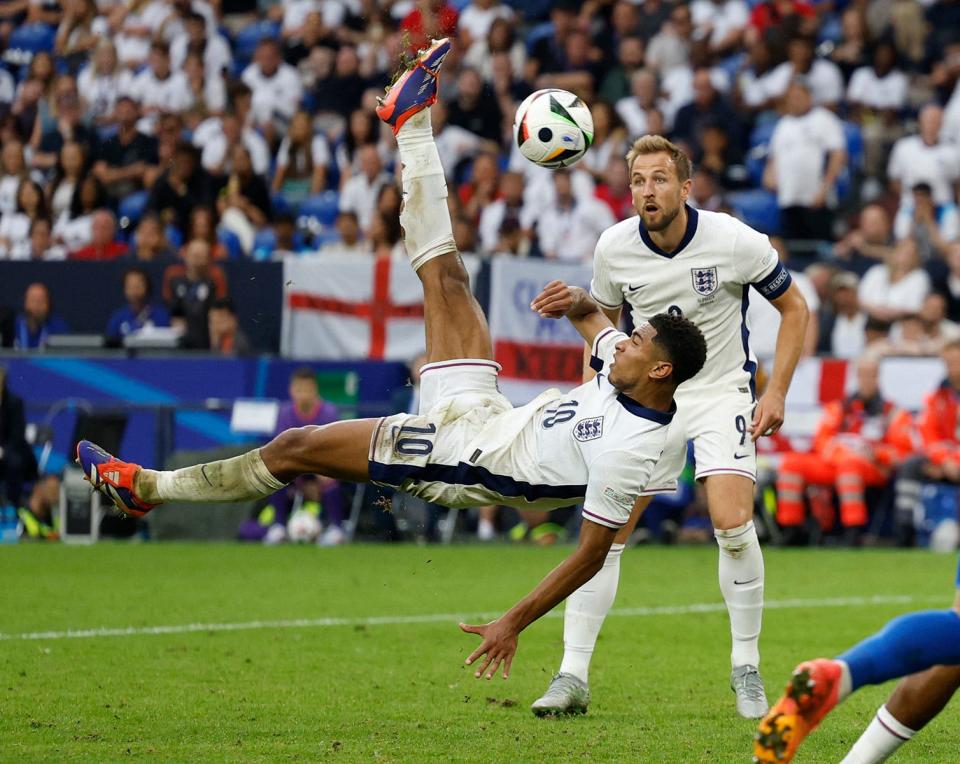 England's Jude Bellingham scores their first goal against Slovakia at Arena AufSchalke, Gelsenkirchen, Germany.