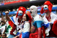 <p>Russian fans don body paint to show their colours in the stands at the Luzhniki Stadium. (PA) </p>