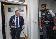 <p>Former White House press secretary Sean Spicer shows his ID to a Uniformed Secret Service officer as he enters the West Wing of the White House in Washington, Friday, Aug. 11, 2017, during renovations at the White House. (AP Photo/J. Scott Applewhite) </p>