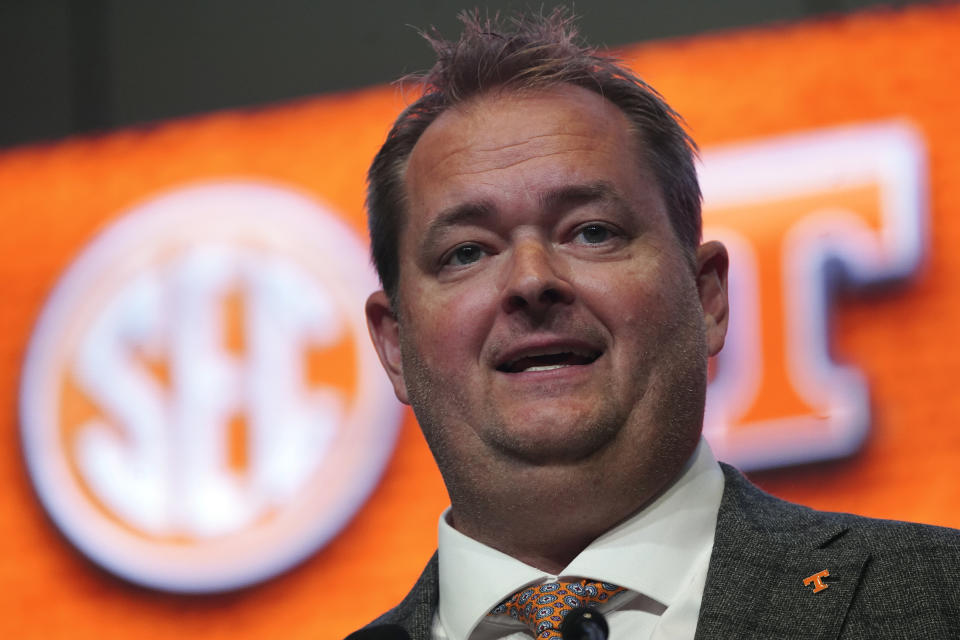 FILE - Tennessee head coach Josh Heupel speaks during NCAA college football Southeastern Conference Media Days on July 21, 2022, in Atlanta. Heupel is trying to rebuild a program dealing with an NCAA investigation that alleges 18 major rules violations involving recruiting issues. (AP Photo/John Bazemore, File)