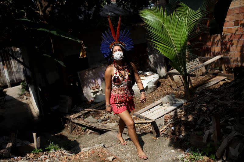 Samela Satere-Mawe, a 24-year-old biology student and Indigenous activist walks in Manaus