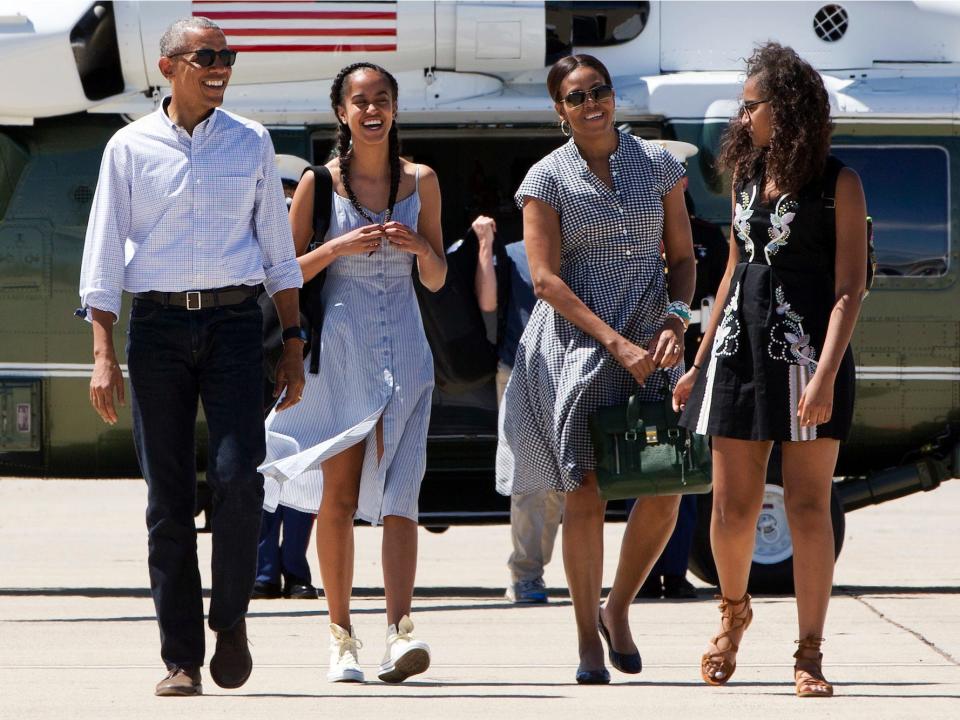 barack obama and family walking