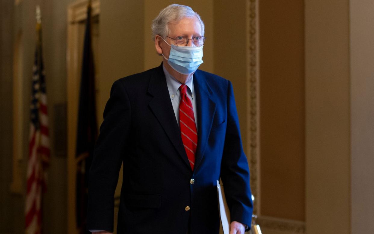  Mitch McConnell walks from his office to the Senate floor on Capitol Hill  - Michael Reynolds/Shutterstock