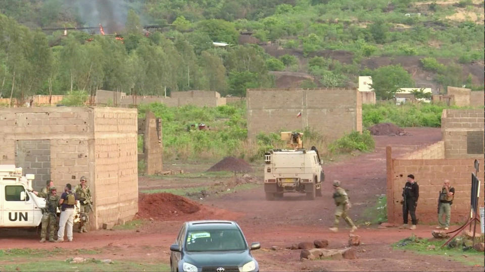 <p>An armoured vehicle drives towards Le Campement Kangaba resort following an attack where gunmen stormed the resort in Dougourakoro, to the east of the capital Bamako, Mali in this still frame taken from video June 18, 2017. (Reuters TV) </p>