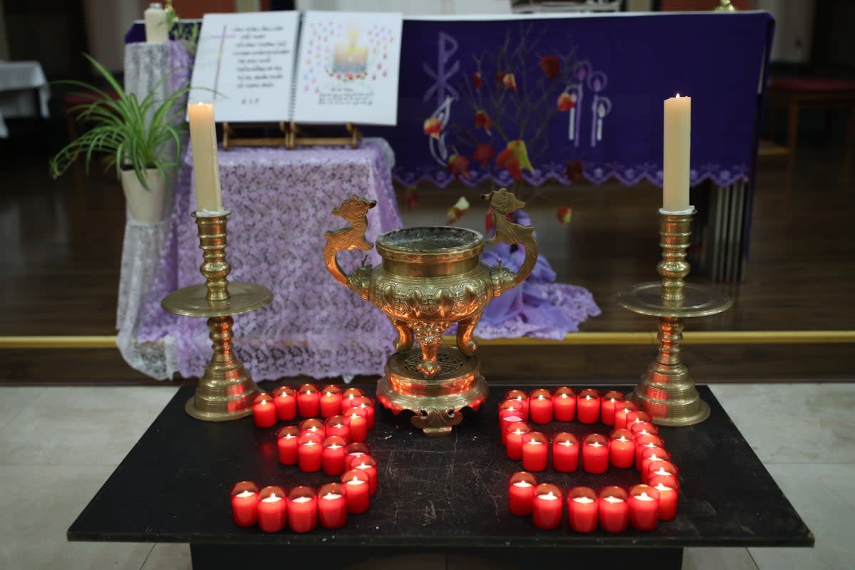 Candles laid out as part of the ceremony for the mass prayer and vigil for the 39 victims found dead inside the back of a truck in Grays, Essex, at the Holy Name and Our Lady of the Sacred Heart Church, London’s Vietnamese church, in east London (Yui Mok/PA) (PA Archive)