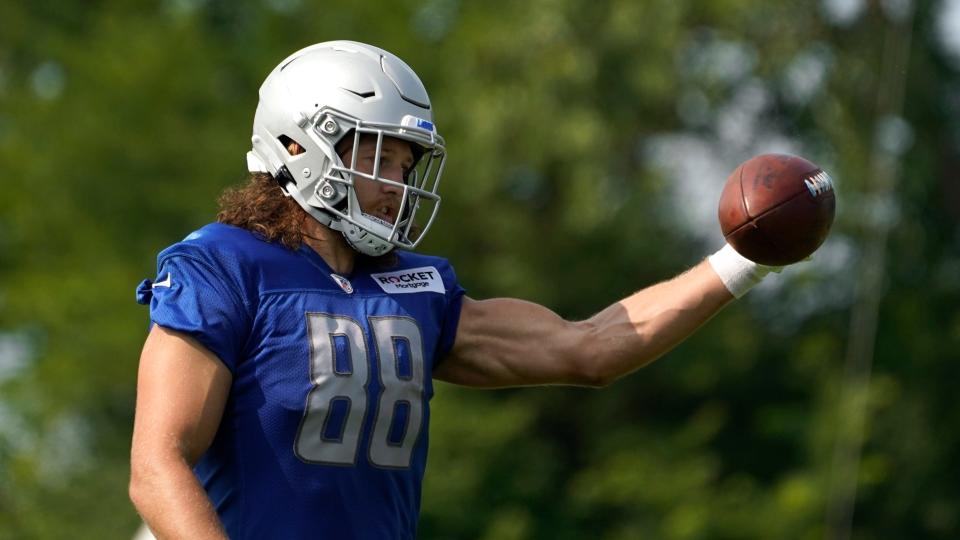 Lions tight end T.J. Hockenson catches a ball during training camp practice in Allen Park on Saturday, July 31, 2021.