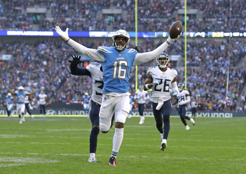 Los Angeles Chargers wide receiver Tyrell Williams (16) celebrates as he scores a touchdown during the first half of an NFL football game against Tennessee Titans at Wembley stadium in London, Sunday, Oct. 21, 2018. (AP Photo/Matt Dunham)