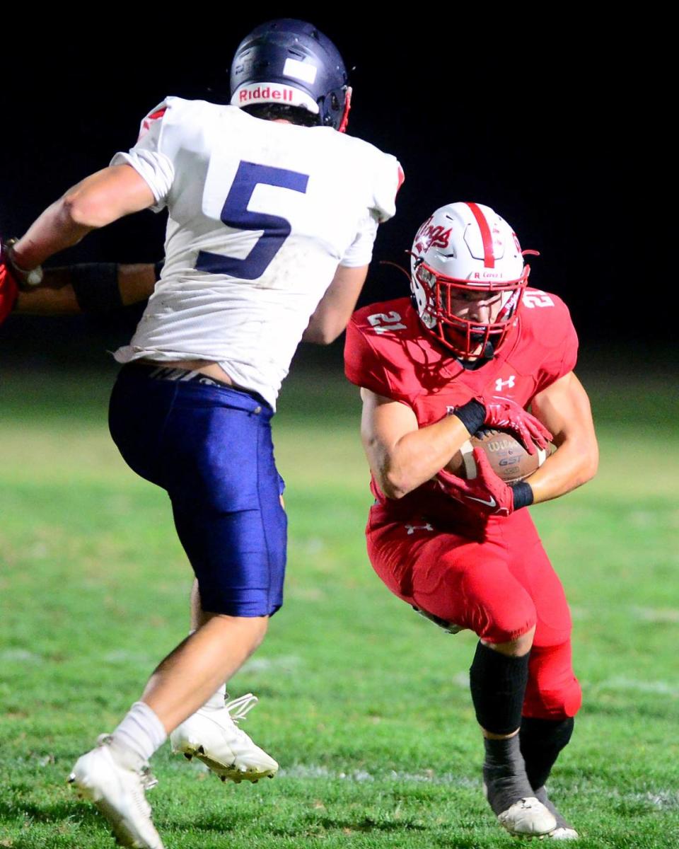 Ceres running back David Diaz Deleon (21) braces for impact during a game between Ceres and Beyer at Ceres High School in Ceres California on September 22, 2023.