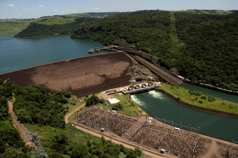 This 2008 photo released by Duke Energy shows an aerial view of the Chavantes Hydroelectric Plant, at Paranapanema river, Sao Paulo state, Brazil. Other investors are wary of Brazil, but when Duke Energy wanted to sell 10 hydroelectric dams there, a Chinese utility shrugged off the country’s economic turmoil and paid $1.2 billion to add them to an energy empire that stretches from Malaysia to Germany to the Amazon. (Duke Energy via AP)