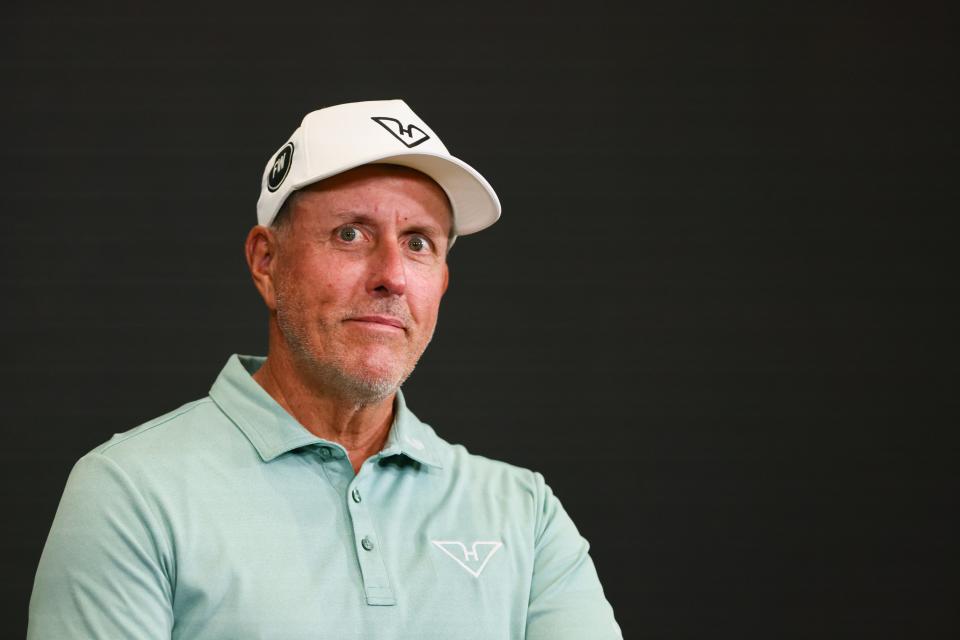 Phil Mickelson talks to reporters during a LIV Golf Miami practice round at Trump National Doral.