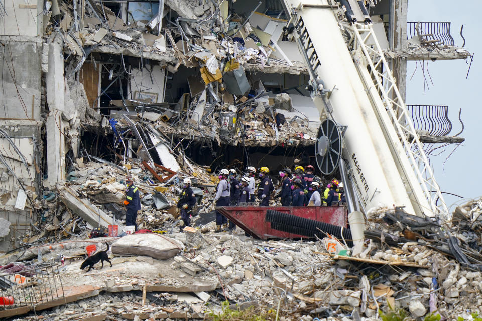 Crews work in the rubble of Champlain Towers South residential condo, Tuesday, June 29, 2021, in Surfside, Fla. Many people were still unaccounted for after Thursday's fatal collapse. (AP Photo/Lynne Sladky)