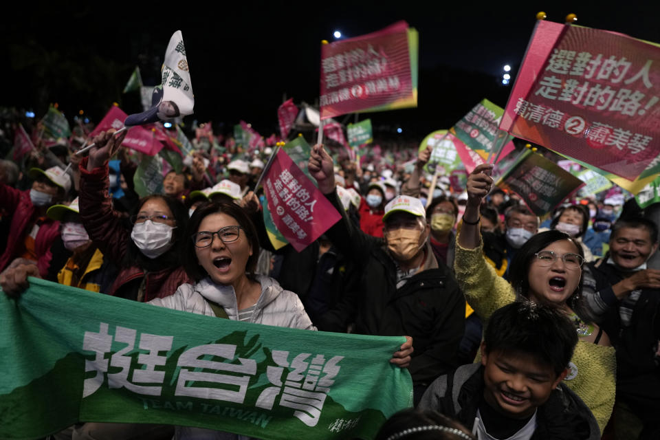 Supporters cheer for the Democratic Progressive Party during an elections rally in New Taipei City, Taiwan on Saturday, Jan. 6, 2024. Using military threats, diplomatic pressure, fake news and financial inducements for politicians, China is deploying a broad strategy to influence voters in Taiwan’s elections to pick candidates who favor unification. (AP Photo/Ng Han Guan)