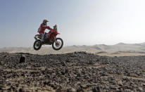 Portugal's Helder Rodrigues rides his Honda during the 3rd stage of the Dakar Rally 2013 from Pisco to Nazca January 7, 2013. REUTERS/Jacky Naegelen (PERU - Tags: SPORT MOTORSPORT TPX IMAGES OF THE DAY)