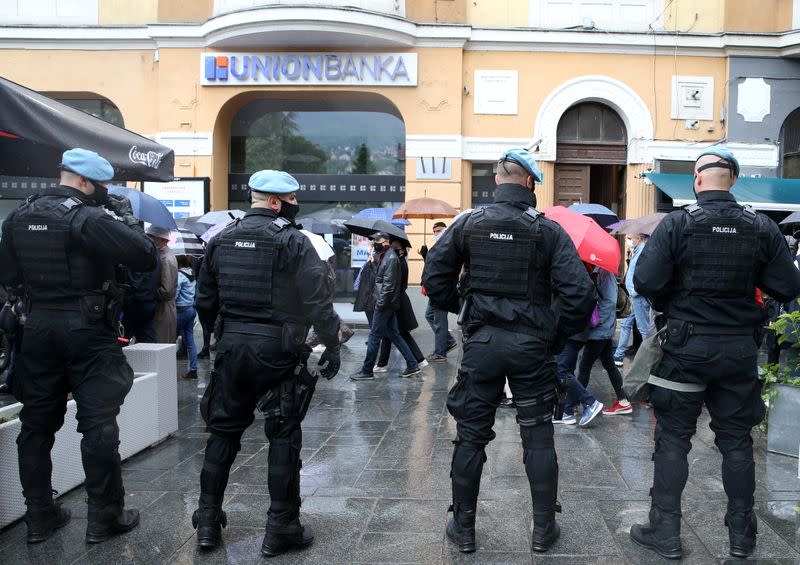 Special Police officers block a street during a protest against corruption and a delayed election in Sarajevo