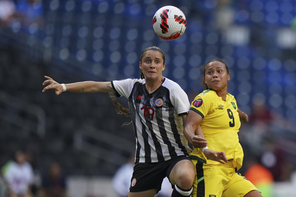 Costa Rica's Maria Paula Salas, left, and Jamaica's Drew Spence fight for the ball during a CONCACAF Women's Championship soccer match for third place, in Monterrey, Mexico, Monday, July 18, 2022. (AP Photo/Fernando Llano)