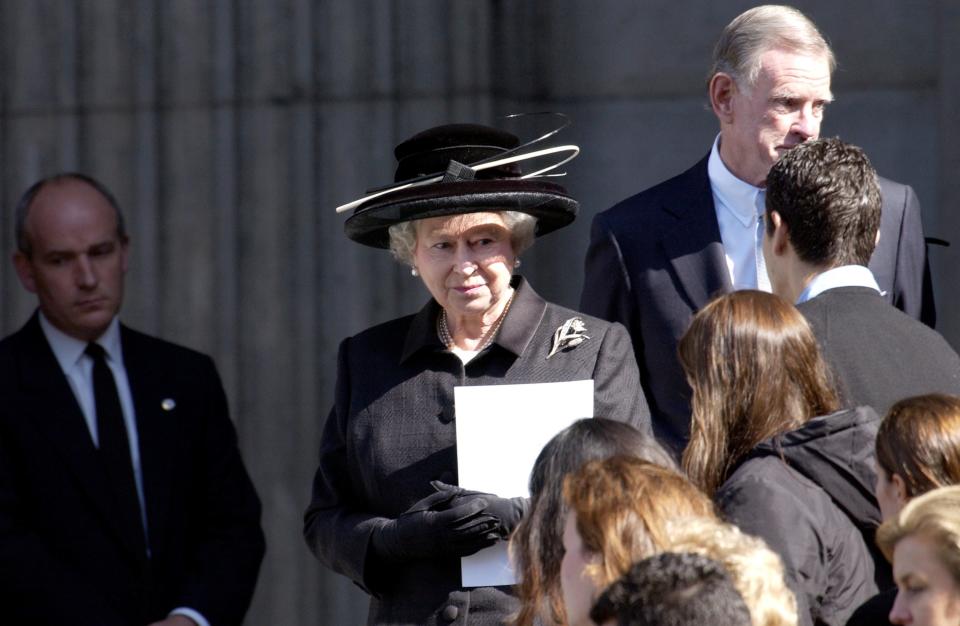 The Queen looking somber at St. Paul's Cathedral after a memorial service for the victims of the World Trade Center Twin Tower attacks.