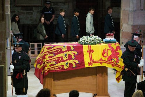 <span class="caption">People file past the Queen's coffin in St Giles' church, Edinburgh. </span> <span class="attribution"><a class="link " href="https://www.alamy.com/members-of-the-public-file-past-the-coffin-of-queen-elizabeth-ii-in-st-giles-cathedral-edinburgh-as-it-lies-at-rest-picture-date-monday-september-12-2022-image482353992.html?imageid=DB6B88CA-40BF-43C2-B1D0-6BD5CB95393E&p=0&pn=undefined&searchId=1c4bc14fdbae26097f14e8d2c386bfc7&searchtype=0" rel="nofollow noopener" target="_blank" data-ylk="slk:PA Images/Alamy;elm:context_link;itc:0;sec:content-canvas">PA Images/Alamy</a></span>