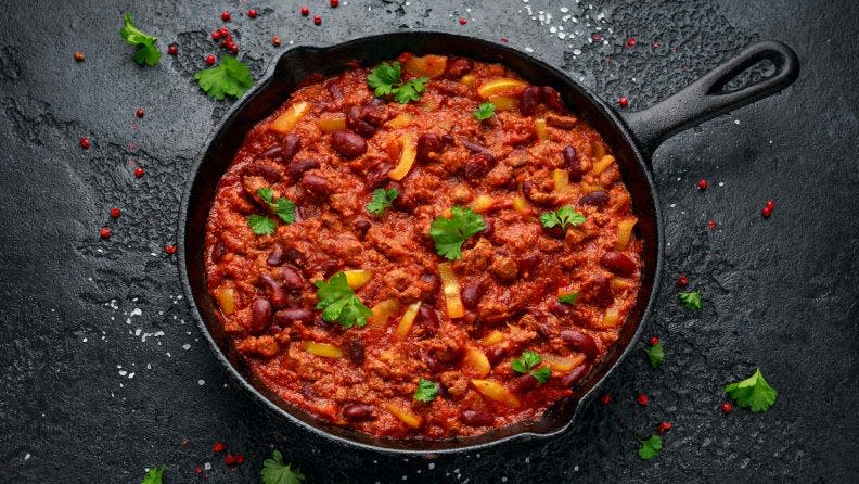 Vegan Impossible chili in cast iron skillet pan.