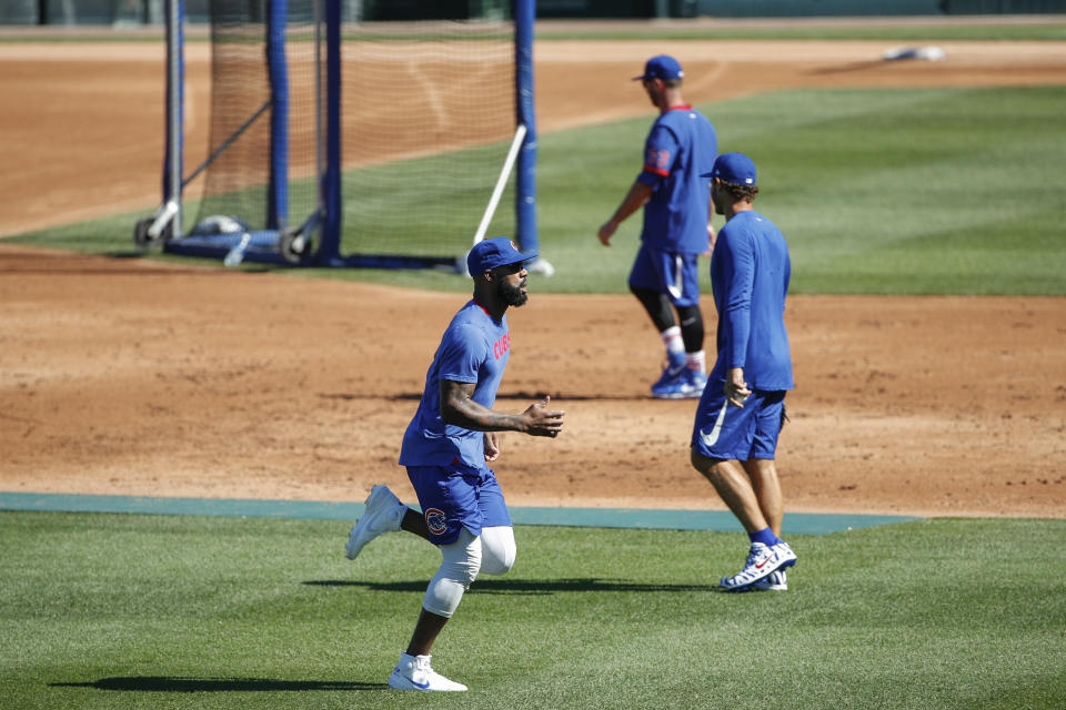 Chicago Cubs right fielder Jason Heyward warms up during baseball practice at Wrigley Field on Friday, July 3, 2020 in Chicago. (AP Photo/Kamil Krzaczynski)