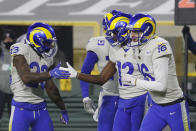 Los Angeles Rams' Van Jefferson (12) celebrates his touchdown catch from quarterback Jared Goff (16) during the first half of an NFL divisional playoff football game against the Green Bay Packers, Saturday, Jan. 16, 2021, in Green Bay, Wis. (AP Photo/Mike Roemer)