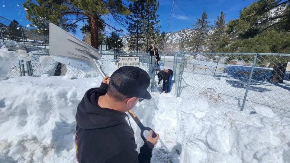 Serrano High School Fire Science students helped  San Bernaridno County Fire Department Station 14 remove snow in Wrightwood.