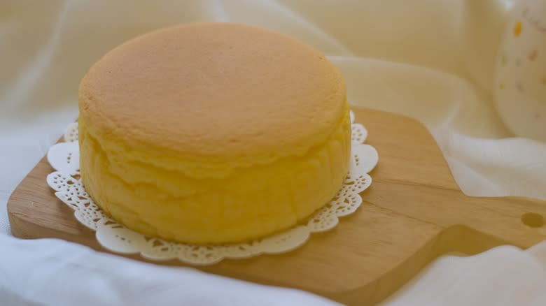 Japanese cheesecake on a wooden cutting board