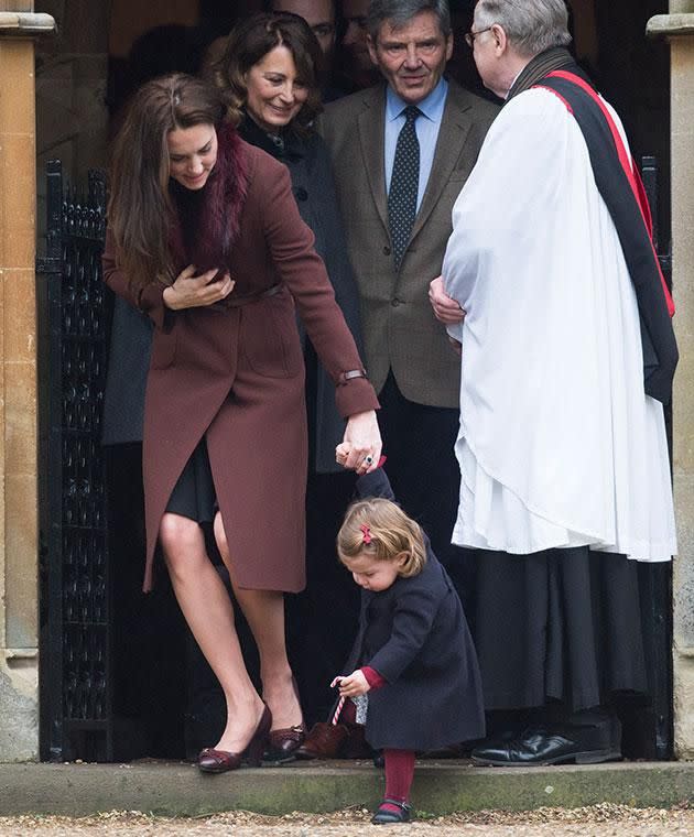 George's little sister Charlotte seemed more intent on poking her candy cane into the ground. Photo: Getty images