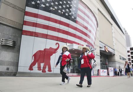 Delegates walk outside the arena at the Republican National Convention in Cleveland, Ohio, U.S. July 18, 2016. REUTERS/Aaron Josefczyk