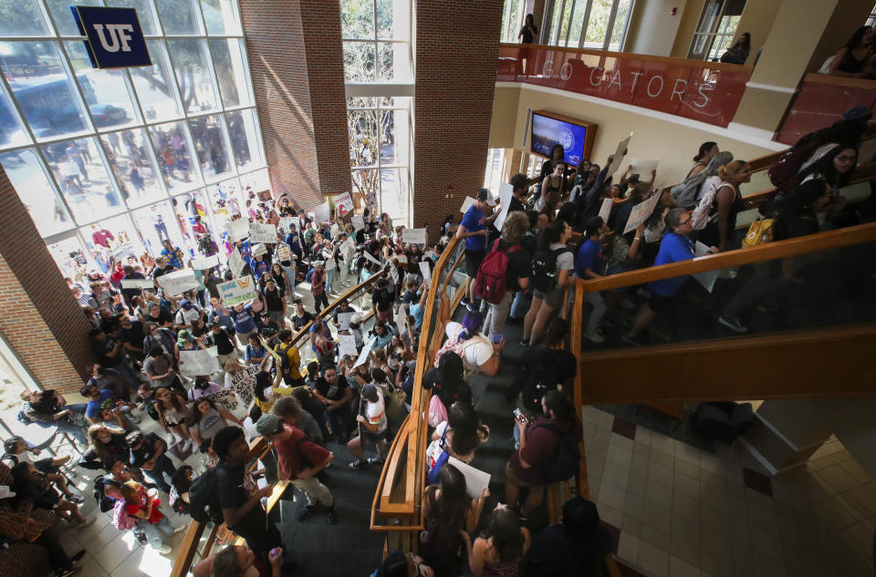 Students protest as Sen. Ben Sasse (Dirk Shadd / Tampa Bay Times via ZUMA Press Wire)