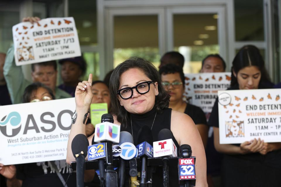 Mony Ruiz-Velasco, director of PASO West Suburban Action Project, addresses reporters during a new conference outside the U.S. Citizenship and Immigration Services offices in Chicago, Thursday, July 11, 2019. A nationwide immigration enforcement operation targeting people who are in the United States illegally is expected to begin this weekend (AP Photo/Amr Alfiky)